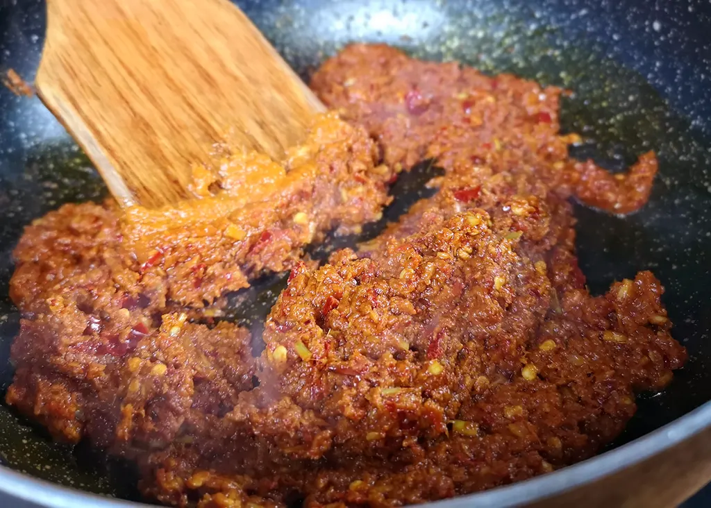 Saute the curry paste with medium low heat