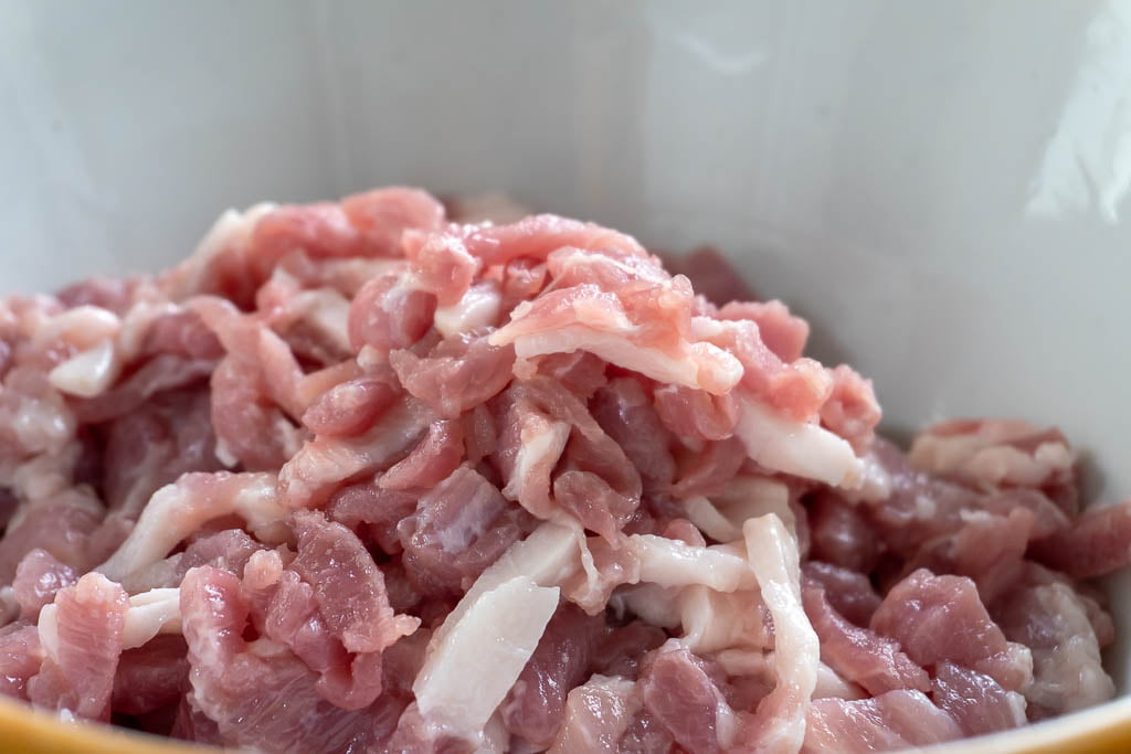 cut the pork meat into thin strips